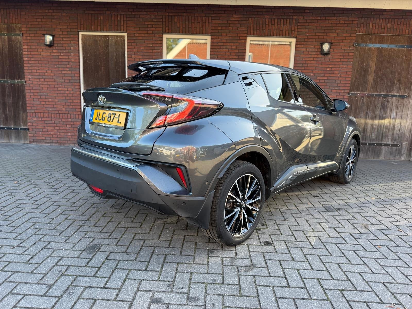 Toyota C-HR 1.2 Executive Automaat |ACC| Camera| Leder| DAB|, Auto's, Dealer onderhouden, Gebruikt, Zwart, 4 cilinders
