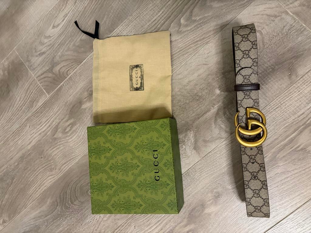 Gucci Riem met GG Monogram en Gouden Gesp, Kleding | Dames, Riemen en Ceinturen, Ophalen of Verzenden, Zo goed als nieuw, Bruin