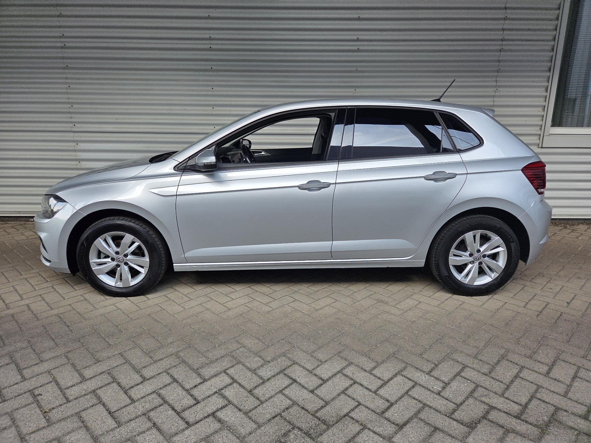 Volkswagen Polo 1.0 TSI Comfortline, Auto's, Voorwielaandrijving, Dealer onderhouden, Stof, 23 km/l
