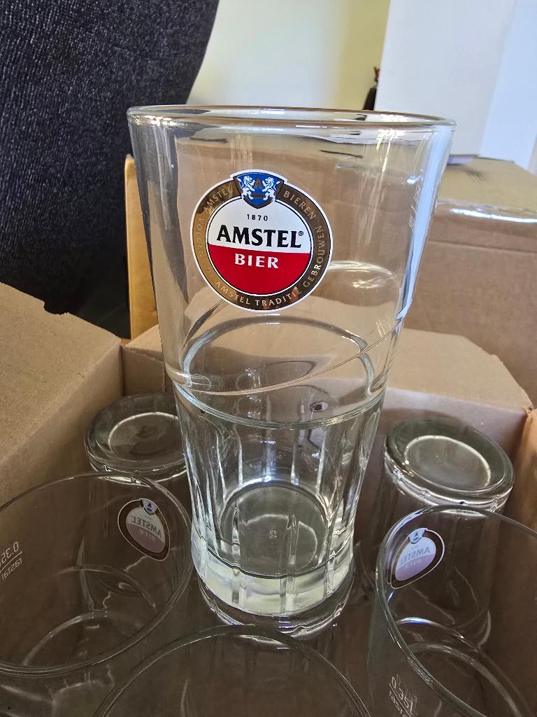 Echte Amstel bierglazen, Verzamelen, Glas en Borrelglaasjes, Ophalen, Zo goed als nieuw, Bierglas