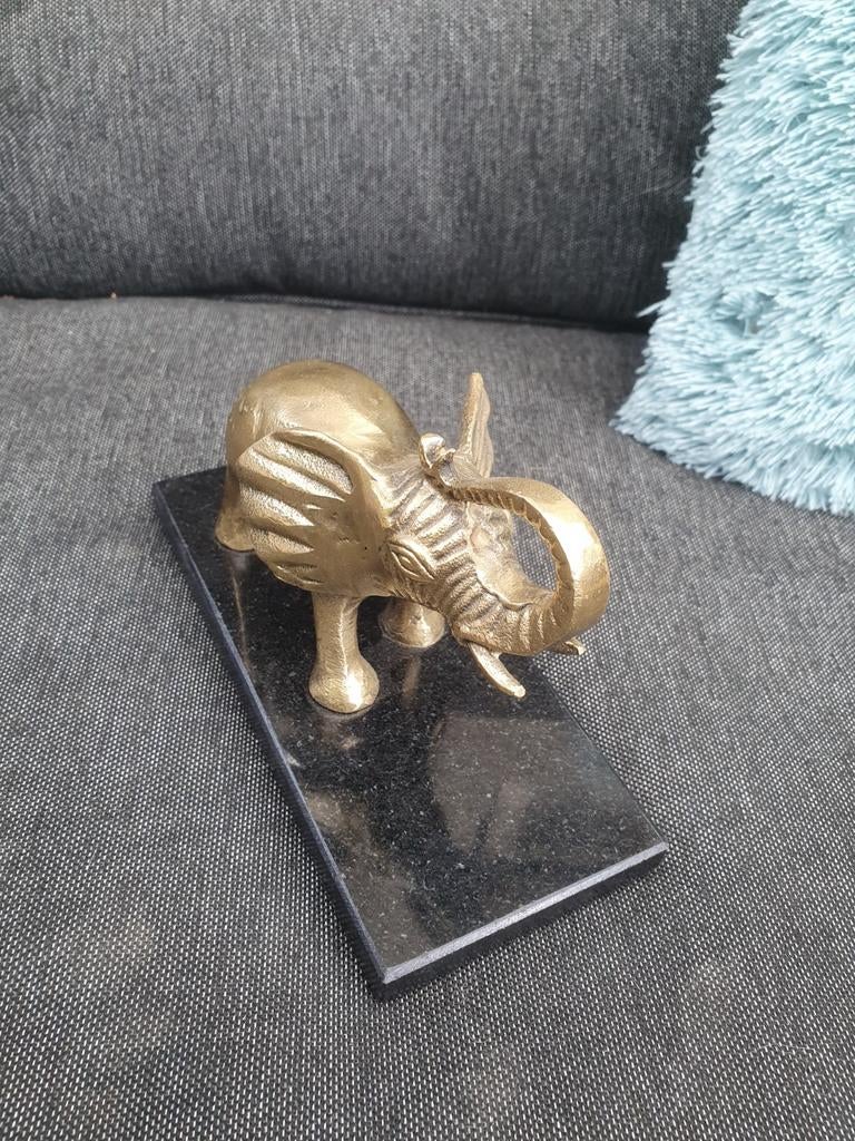 Aluminium olifant op voet, Ophalen