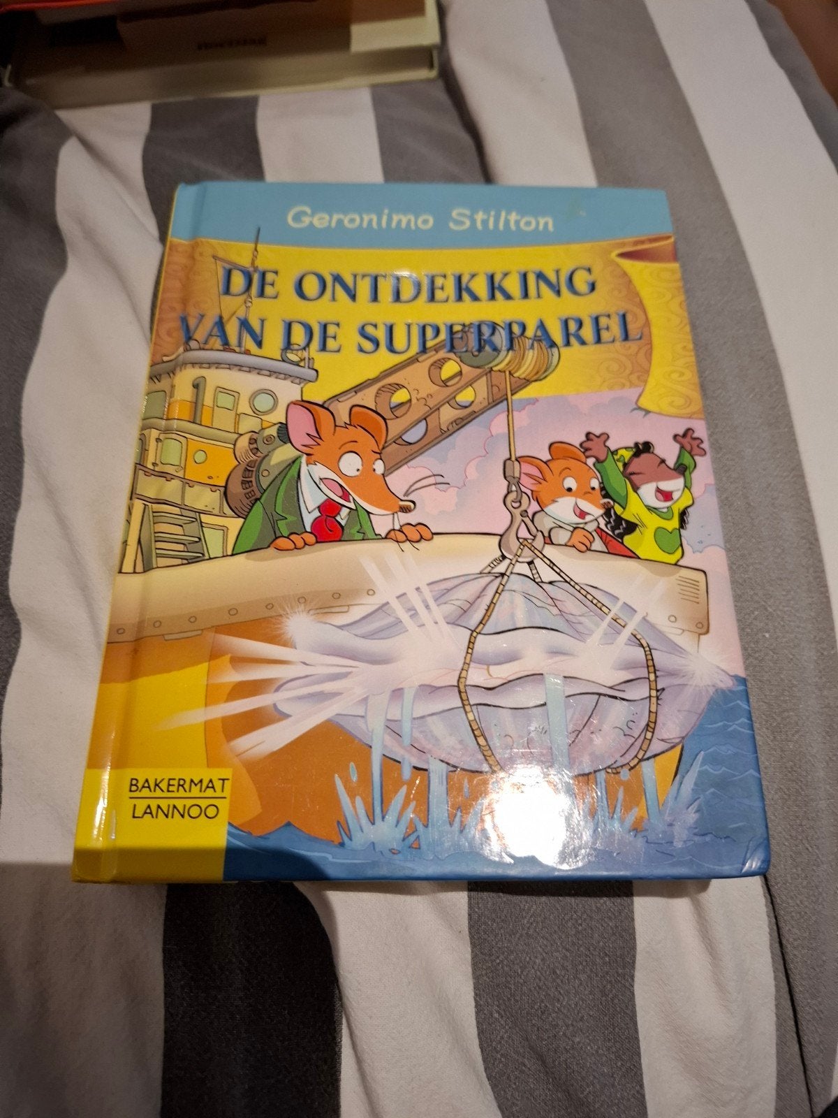 Geronimo Stilton: De Ontdekking van de Superparel, Ophalen of Verzenden, Zo goed als nieuw
