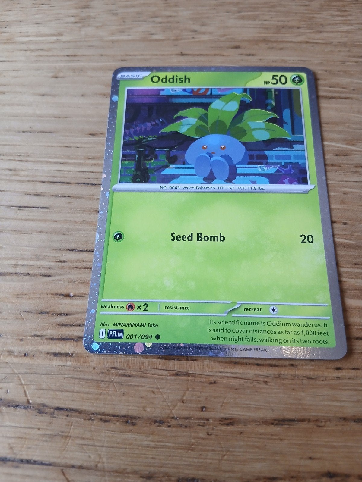 Pokémon Kaart Oddish 001/094 PFL EN - Zo goed als nieuw, Ophalen of Verzenden, Zo goed als nieuw, Losse kaart