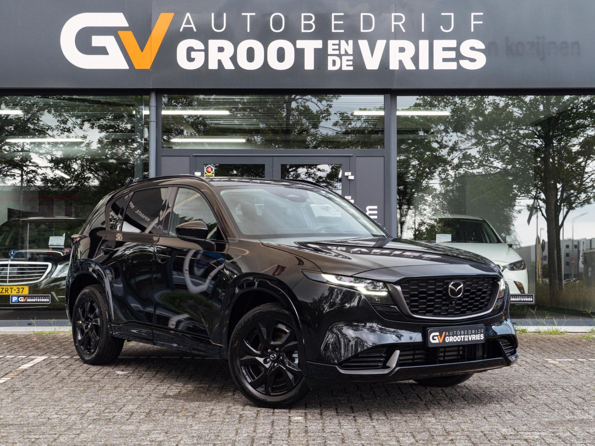 Mazda CX-5 2.5 E-SKYACTIV G 141 M HYBRID Homura|Panorama, Auto's, Gebruikt, Euro 6, 4 cilinders, Zwart