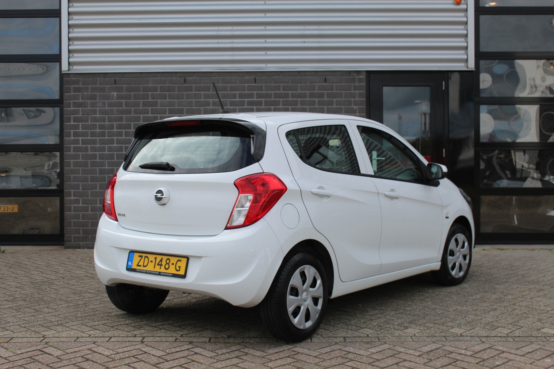 Opel KARL 1.0 ecoFLEX 120 Jaar Edition / Airco / Cruise / N., Auto's, Stof, Met garantie (alle), Wit, Origineel Nederlands