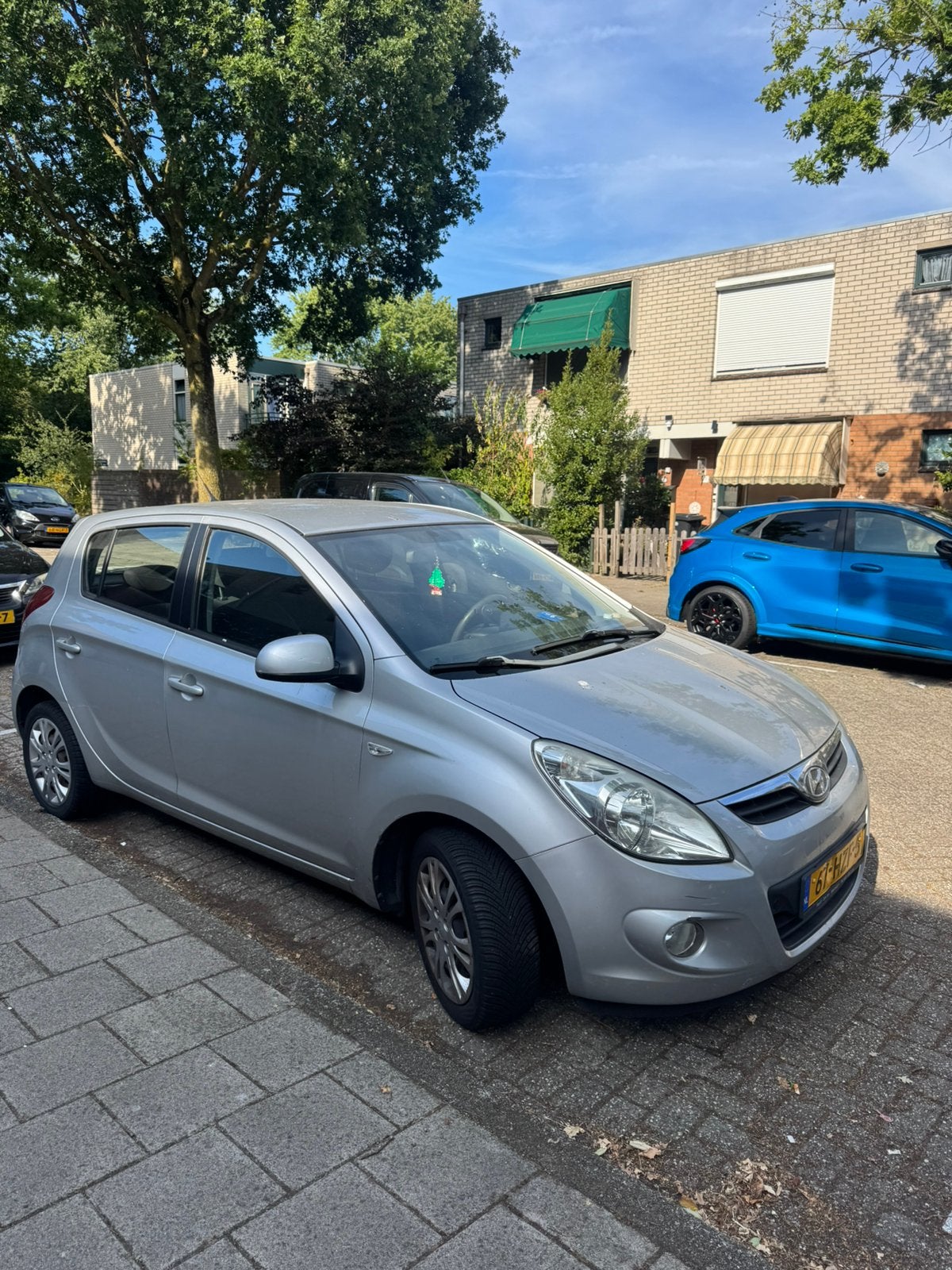 Hyundai i20 1.2 5-DRS 2009 Grijs, Auto's, 450 kg, 4 cilinders, Origineel Nederlands, Handgeschakeld