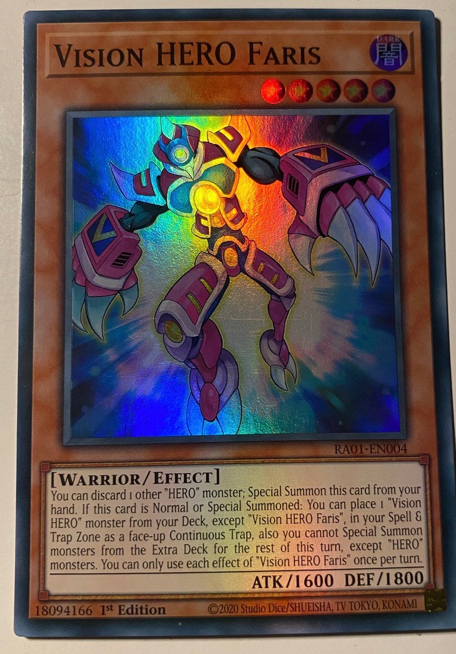 Yu-Gi-Oh! Vision HERO Faris RA01 1st Edition !, Ophalen of Verzenden, Gebruikt, Losse kaart, Foil
