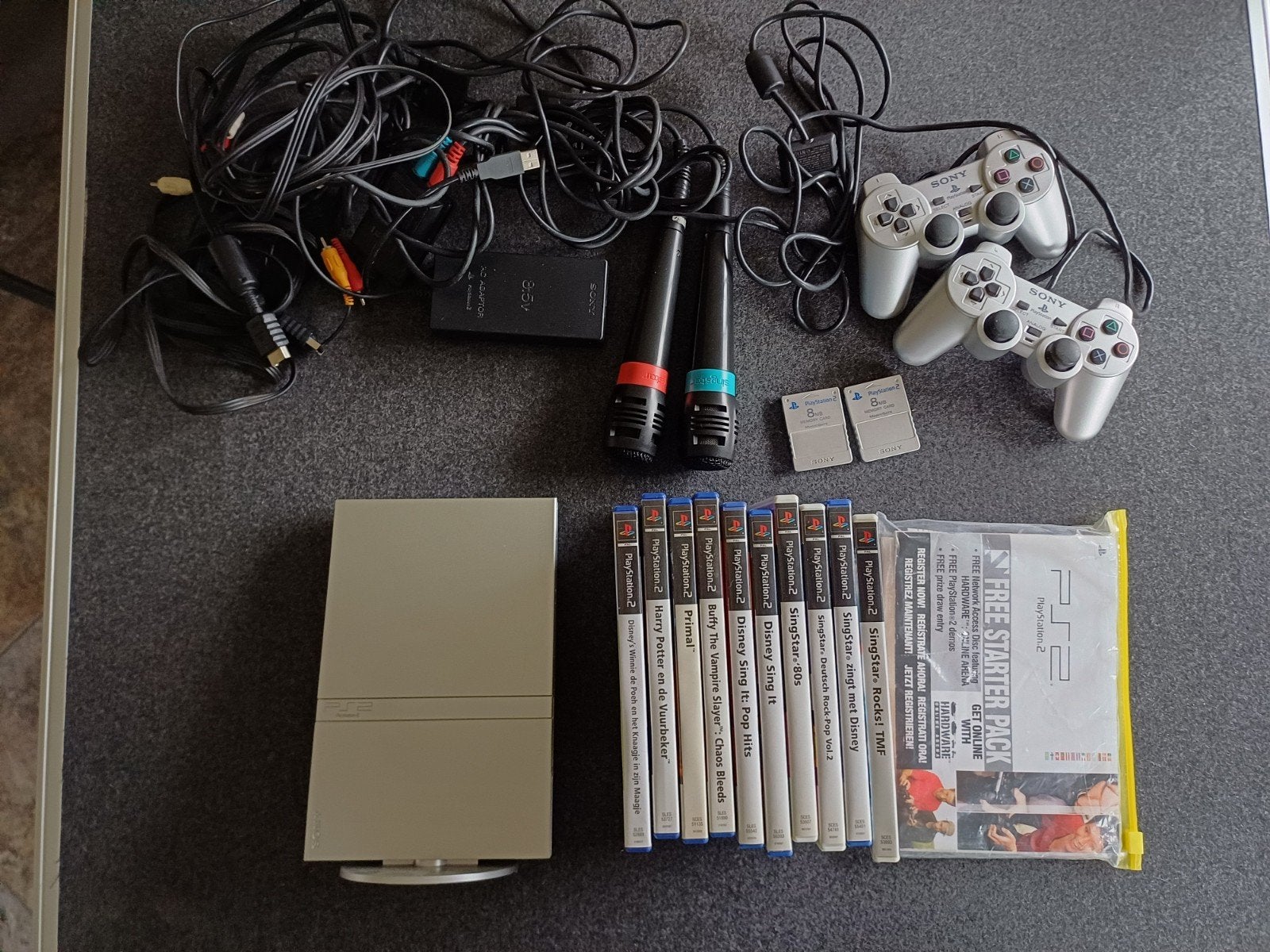 Playstation 2, incl. microfoons, 2 controllers  en spellen, Spelcomputers en Games, Spelcomputers | Sony PlayStation 2, Gebruikt
