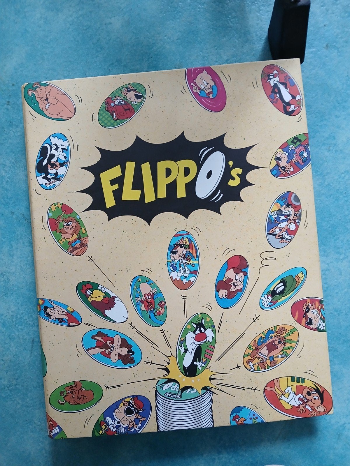 Flippo's verzamelmap met Looney Tunes Flippo's, Verzamelen, Ophalen, Looney Tunes, Verzameling, Met verzamelmap(pen)