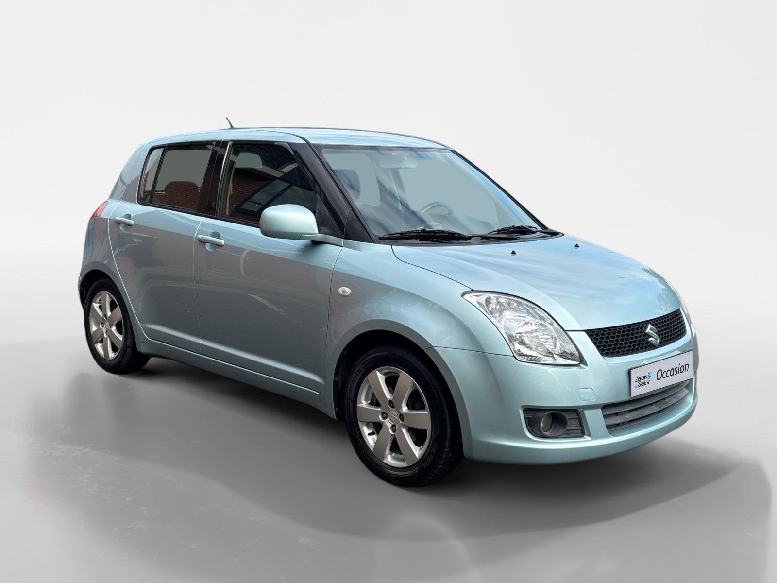Suzuki Swift 1.3 Shogun | Trekhaak | Airco | 12 maanden gara, Auto's, Voorwielaandrijving, 12 maanden, Stof, Zwart