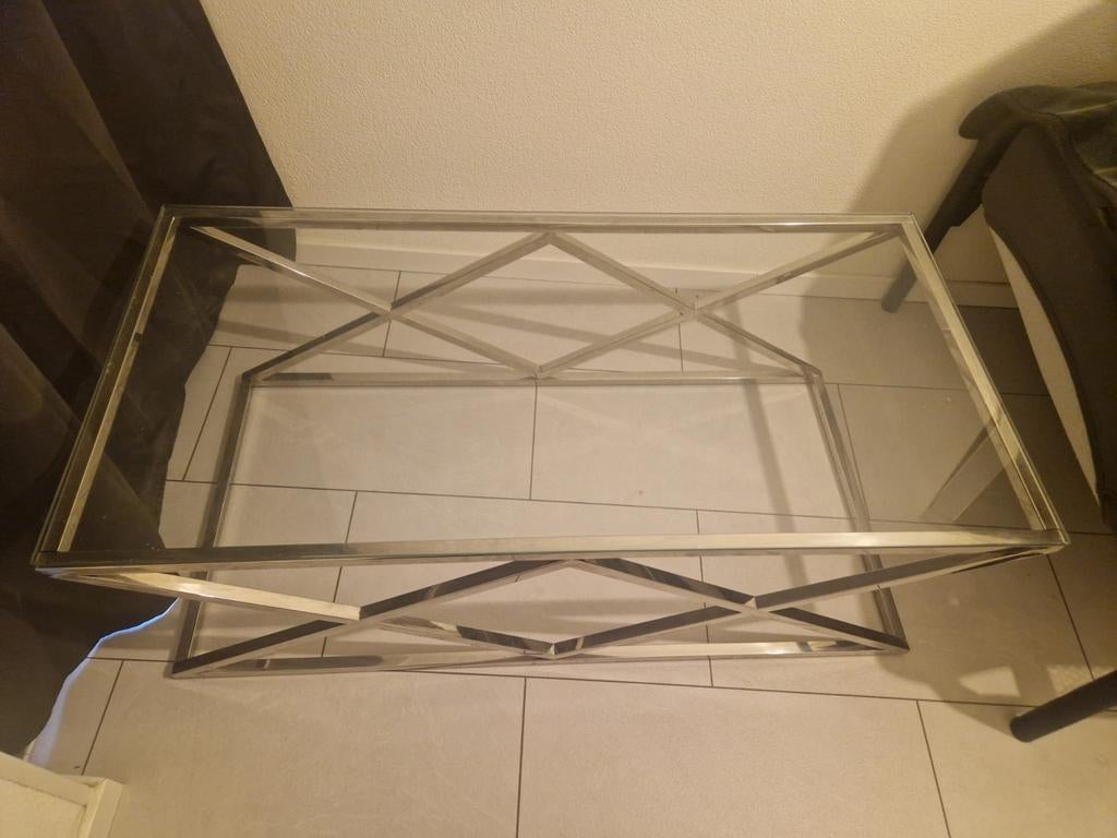 Bijna nieuwe salontafel met glazen blad en metalen onderstel, 100 tot 150 cm, Zo goed als nieuw, Glas, Modern