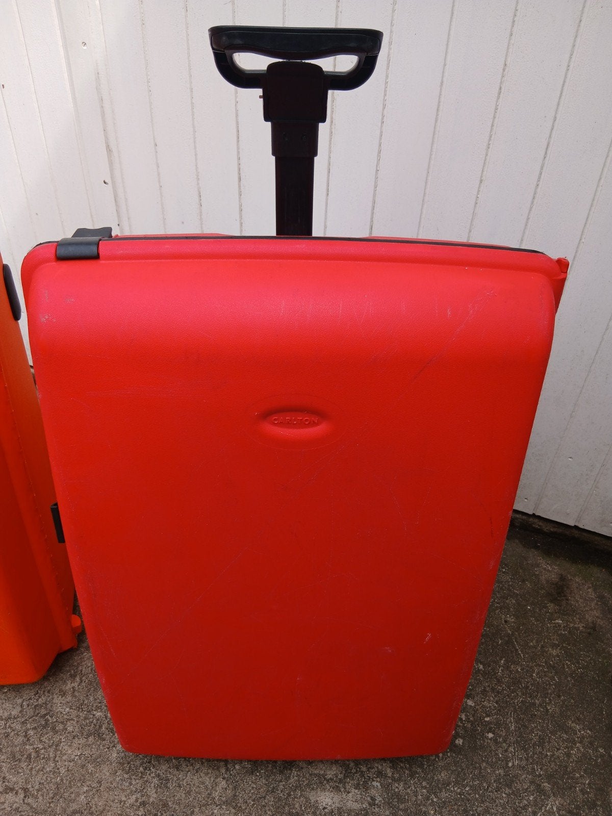 2 koffers van Carlton. 1 rood en 1 oranje, Sieraden, Tassen en Uiterlijk, Koffers, Gebruikt, Hard kunststof, 70 cm of meer, 55 cm of meer