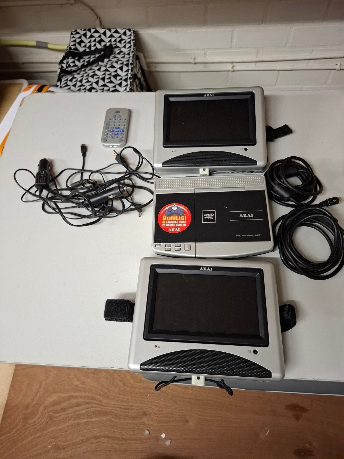 Portable DVD-speler voor in de auto met 2 schermen, Ophalen
