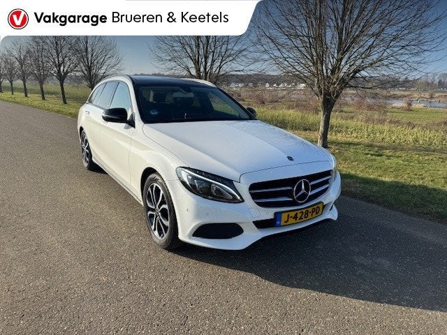 Mercedes-Benz C-Klasse Estate 200 Premium Plus (bj 2017), Auto's, Automaat, 4 cilinders, Leder en Stof, Wit