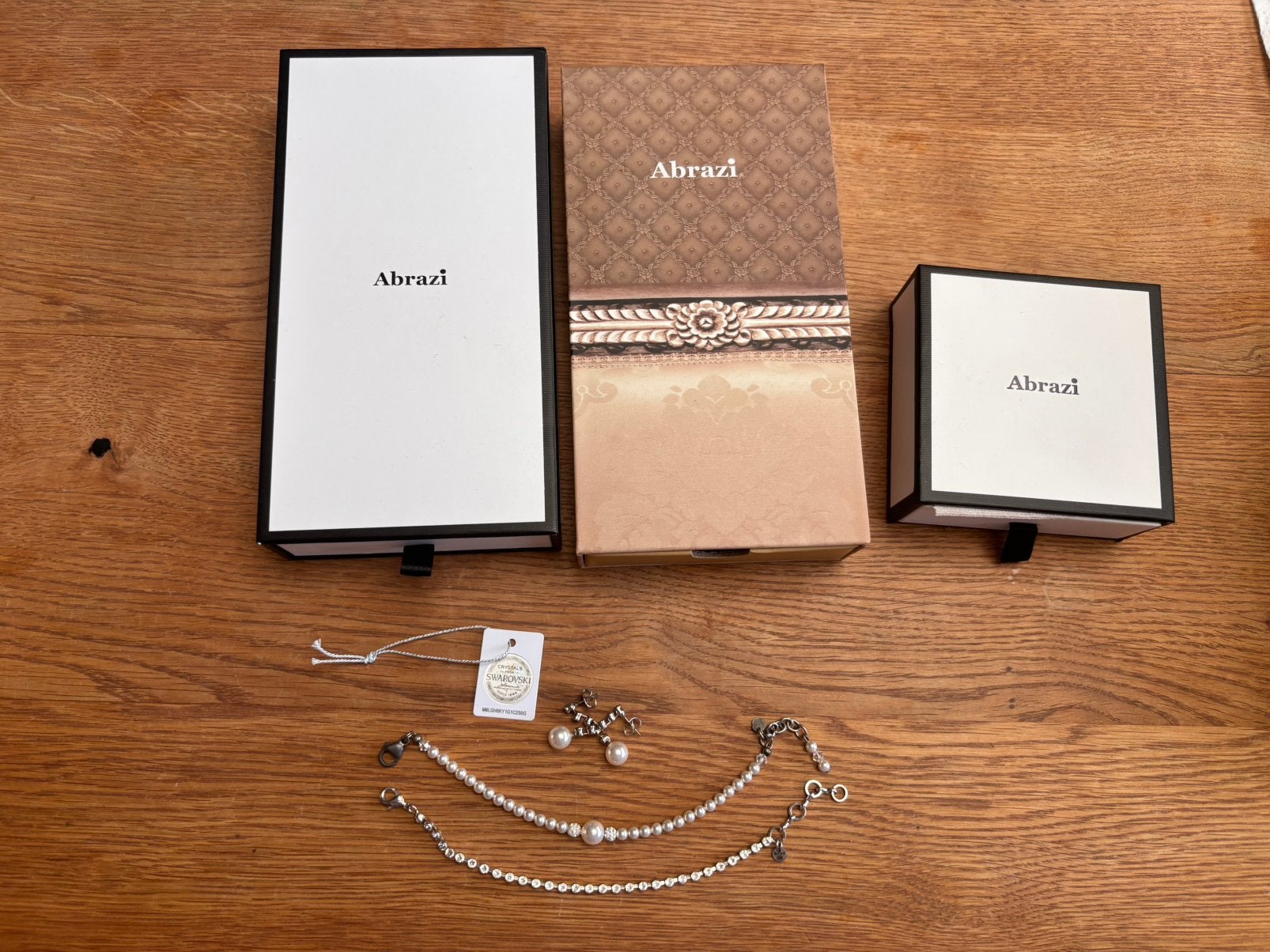Bruidssieraden set Abrazi, 2 armbanden, 1 paar oorbellen, Overige materialen, Zo goed als nieuw, Zilver, Met bedels of kralen