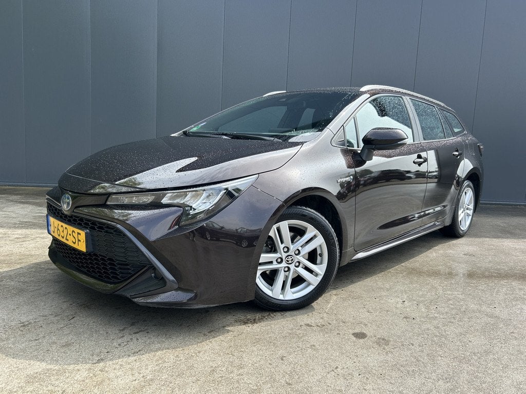 Toyota Corolla Touring Sports 1.8 Hybrid Active 1e EIGENAAR, 450 kg, Gebruikt, 4 cilinders, Bruin