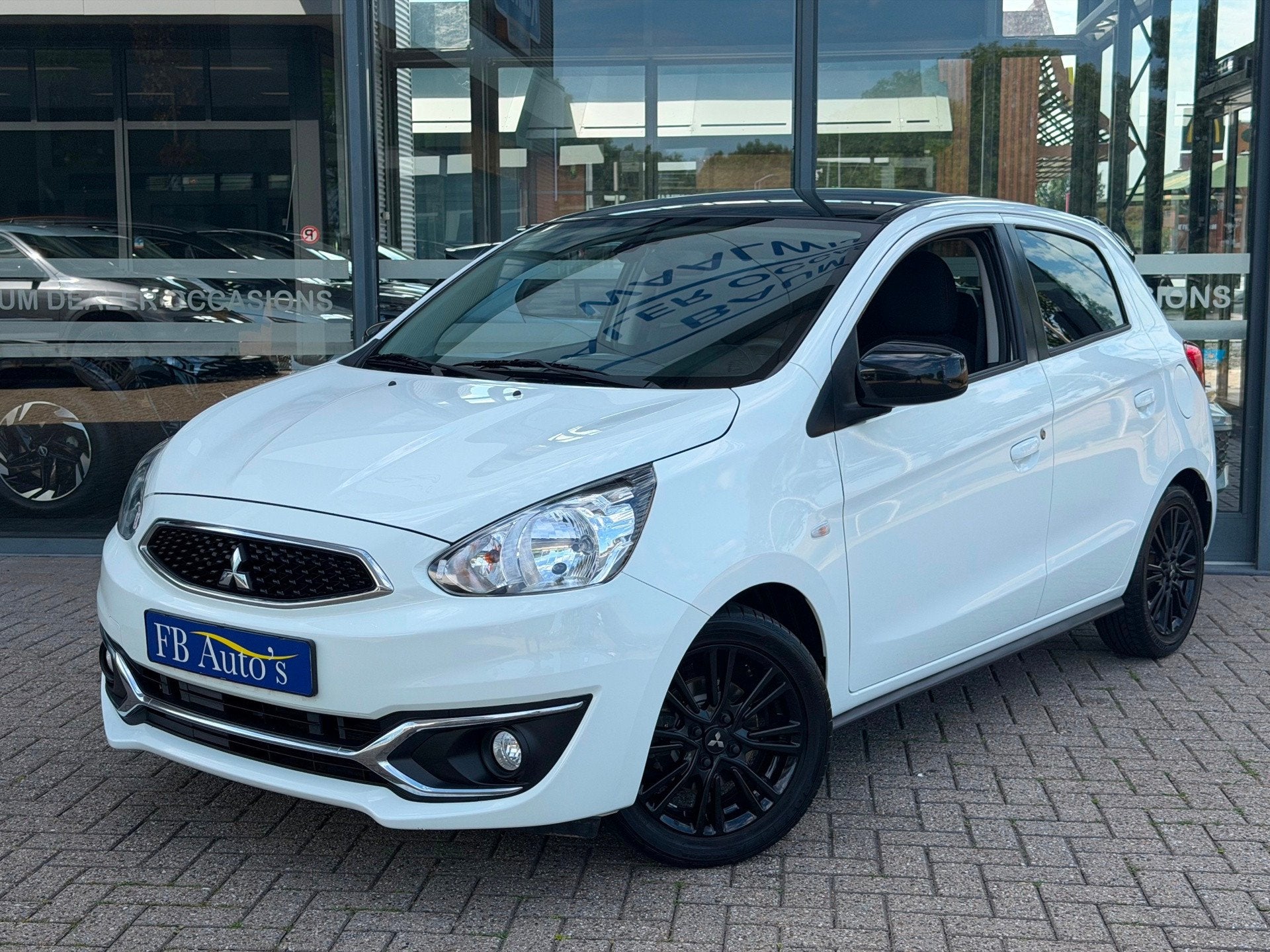 Mitsubishi Space Star 1.0 Diamant Edition+ Airco Lmv Navi Ca, Auto's, Mitsubishi, Voorwielaandrijving, Stof, Gebruikt, Zwart