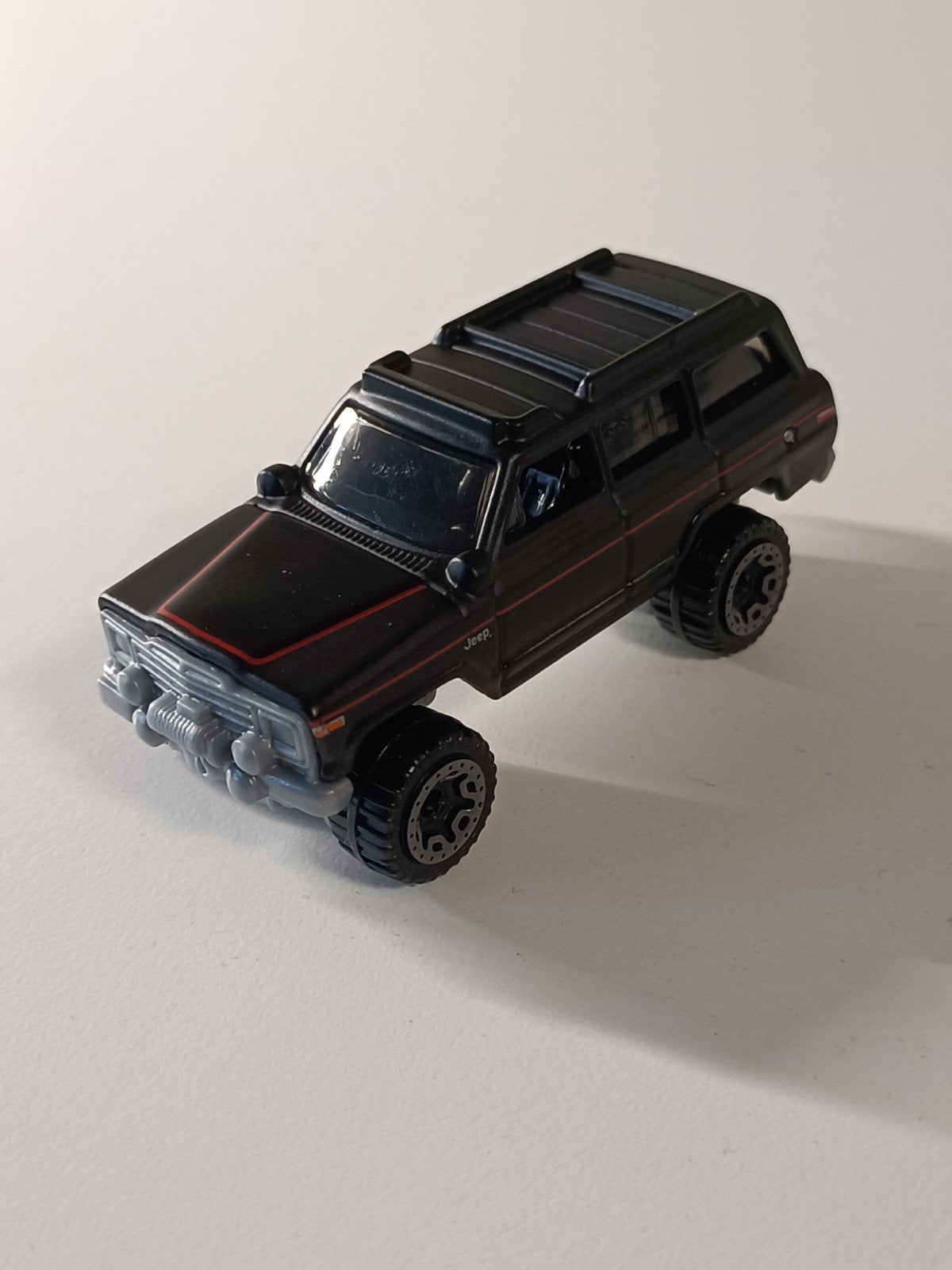 Hot Wheels Jeep Wagoneer - Zwart met rode streep, Ophalen of Verzenden, Zo goed als nieuw