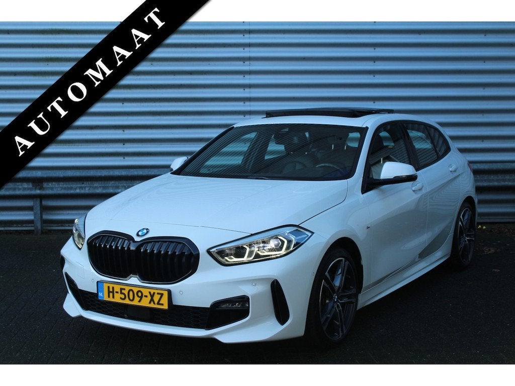 BMW 1-serie 118i 141pk High Executive Edition AUTOMAAT Panor, Auto's, BMW, Gebruikt, Wit, 3 cilinders, 695 kg