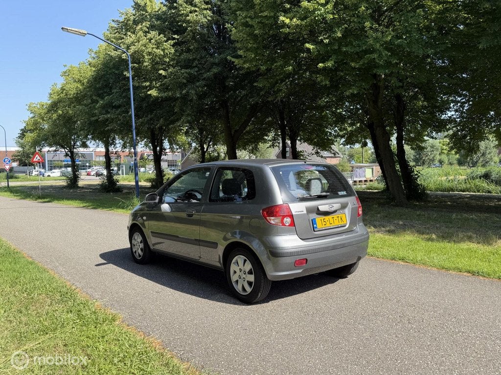 Hyundai Getz 1.3i GLS*NEW APK*AUTOMAAT*NAP*AIRCO*ELEK.RAMEN, Auto's, Hyundai, 4 cilinders, 82 pk, Bedrijf, Grijs