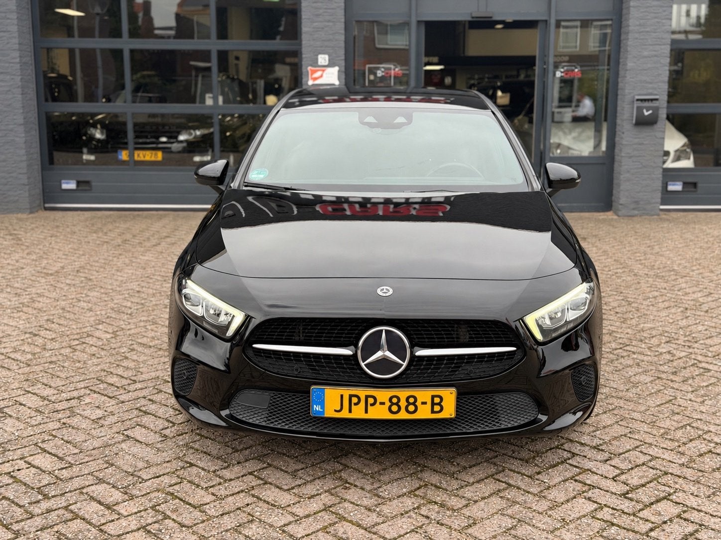 Mercedes-Benz A-klasse 180 AMG | Camera|AmbiLight|Nap|Stoelv, 136 pk, Gebruikt, 4 cilinders, Zwart