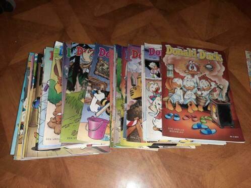 34 Donald duck 2021, Donald Duck / Disney, Ophalen of Verzenden, Zo goed als nieuw, Meerdere stripboeken