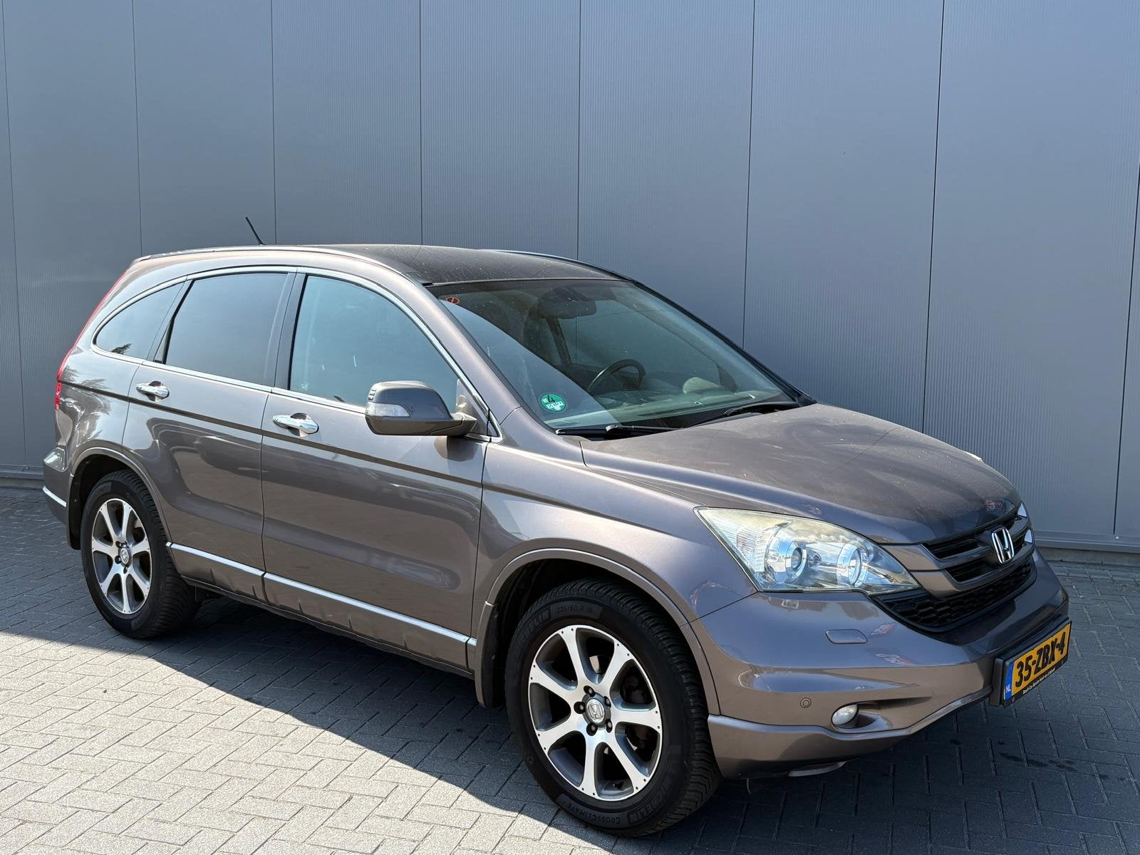 Honda CR-V 2.0i 150PK AWD Executive Leder/Panoramadak/Parkee, Auto's, Euro 5, Gebruikt, Huisgarantie, 4 cilinders