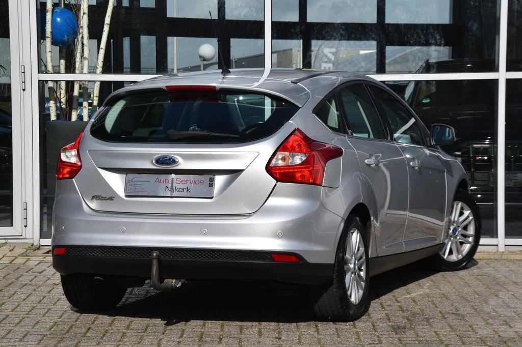 Ford Focus 1.0 EcoBoost Lease Titanium Airco Navi. Pdc Trekh, Auto's, Ford, Euro 5, Gebruikt, Zwart, 635 kg