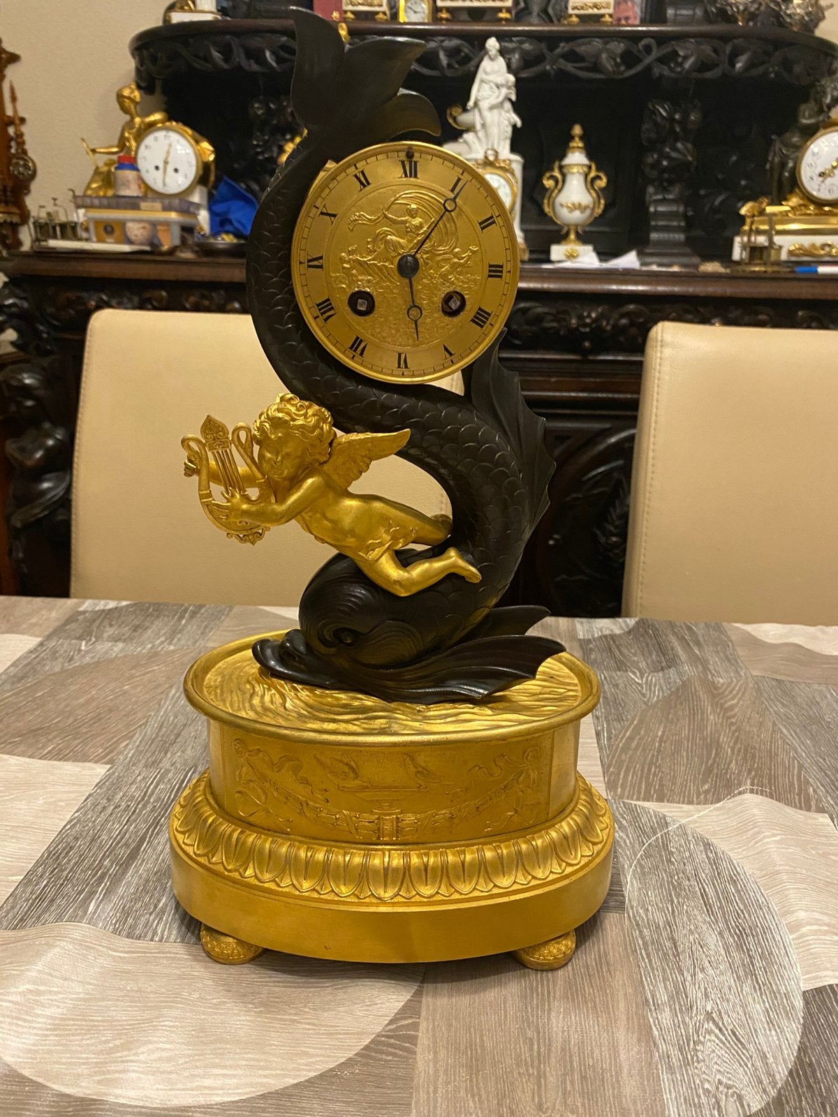 Antieke Franse bronzen klok met cherubijn en dolfijn, Antiek en Kunst, Ophalen of Verzenden