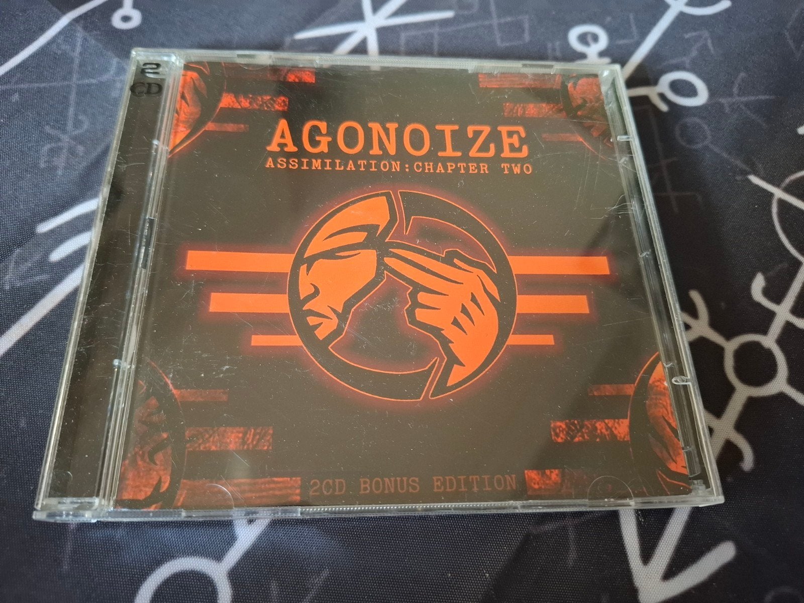 Agonoize - Assimilattion: Chapter Two 2cd 2006, Ophalen of Verzenden, Zo goed als nieuw, Remixalbum, Inclusief boekje