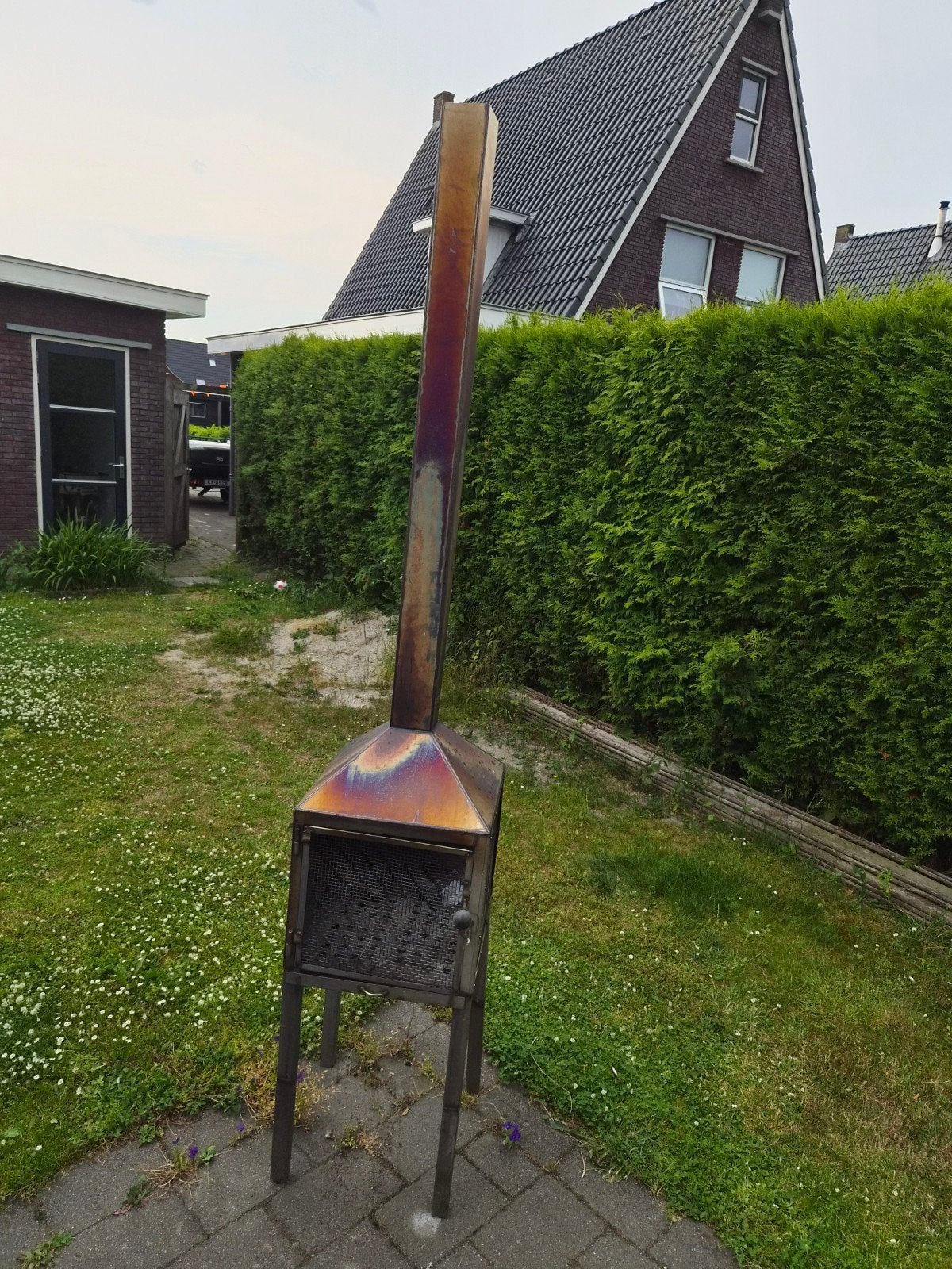 RVS buitenkachel met schoorsteen, Ophalen