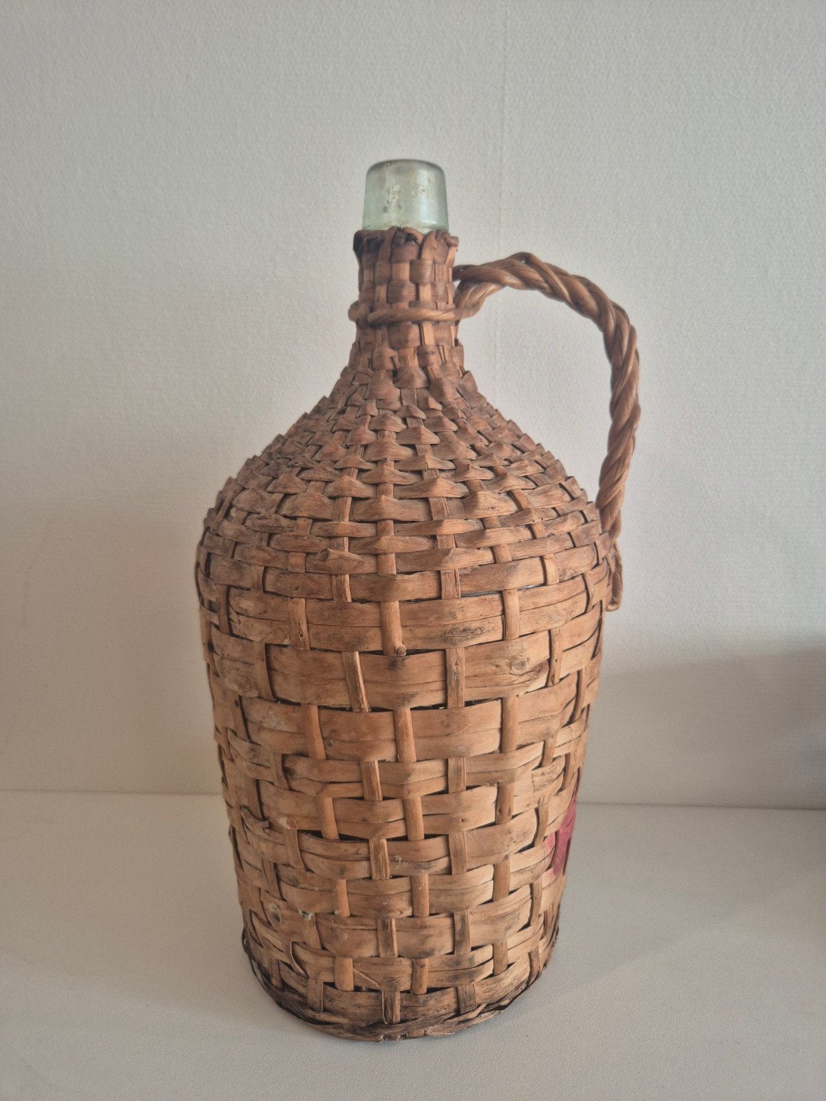 Prachtige vintage mandfles in gevlochten riet, Ophalen of Verzenden