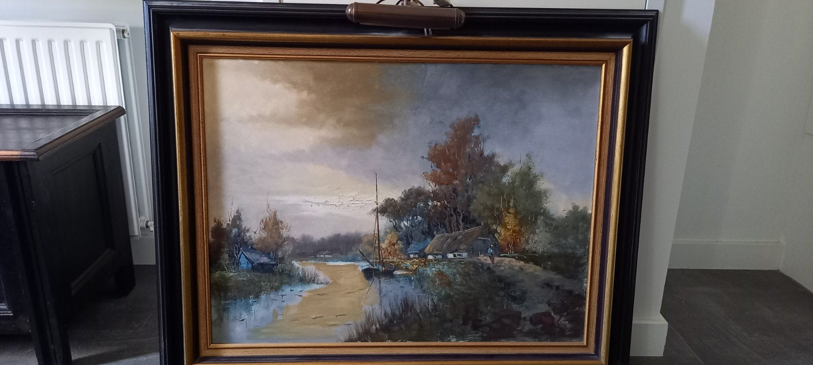 Schilderij van stilleven.met lampje erboven, Ophalen
