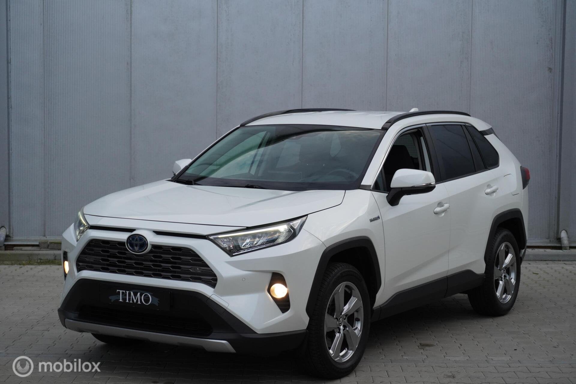Toyota RAV4 2.5 Hybrid AWD Dynamic, Auto's, Automaat, Stof, Gebruikt, Zwart