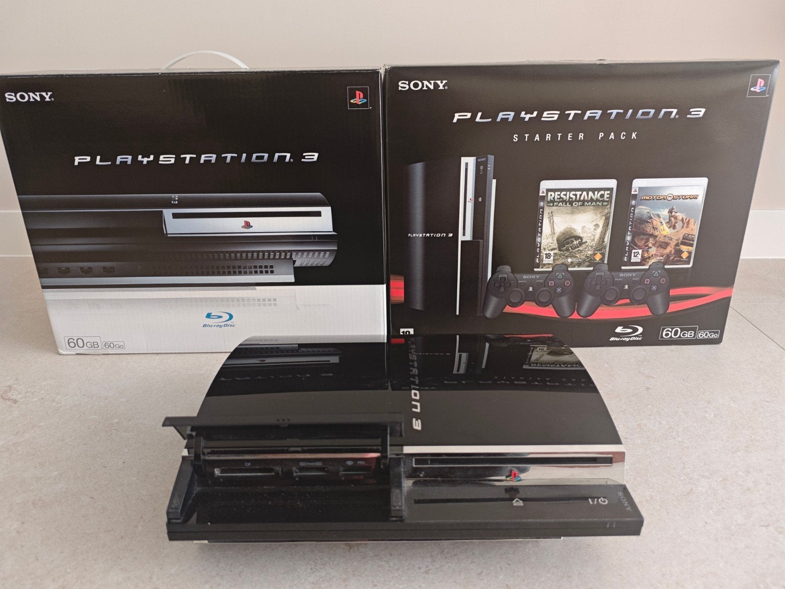 PS3 60GB CECHC04 Starter Pack compleet in doos, Spelcomputers en Games, Verzenden, Phat, Met 2 controllers, Zo goed als nieuw