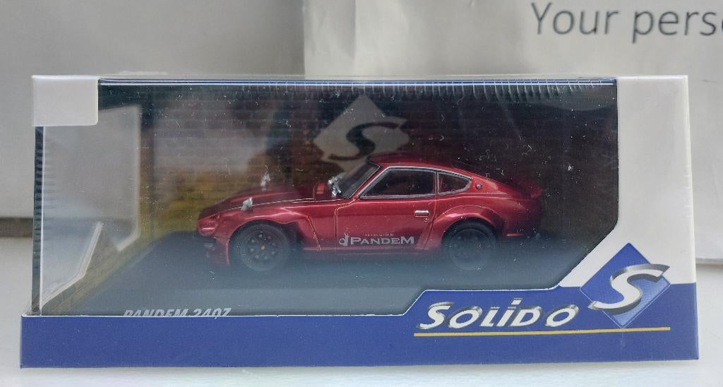 Solido 1:43 Datsun 240Z Rocket Bunny rood metallic nieuw, Hobby en Vrije tijd, Modelauto's | 1:43, Ophalen of Verzenden, Nieuw
