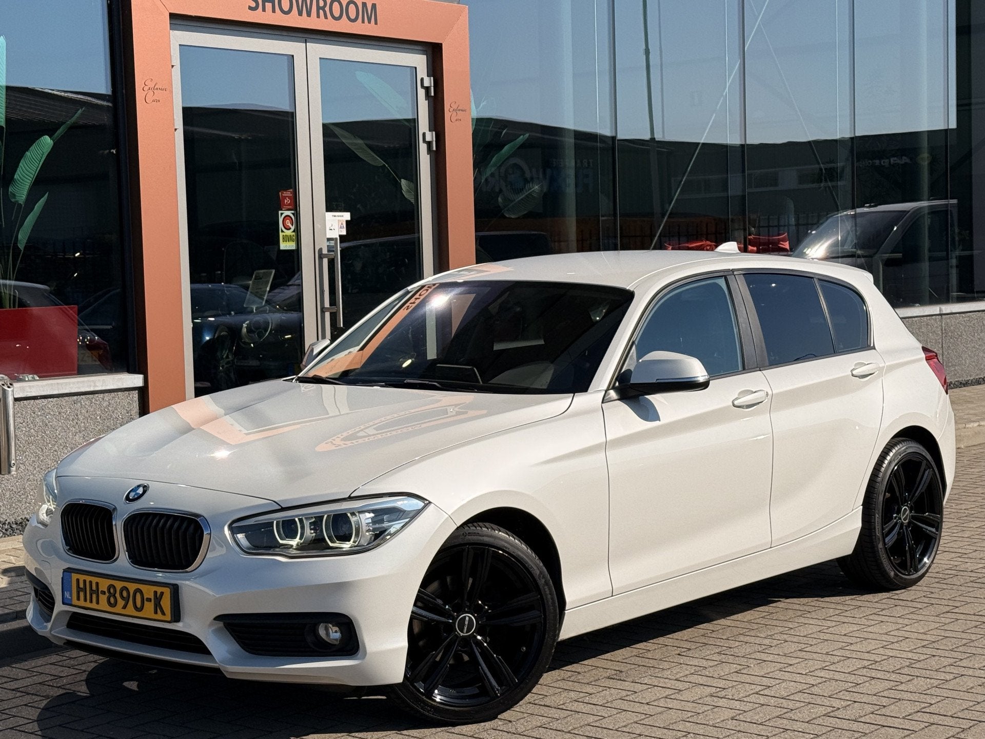 BMW 1-serie 118i EDE Corporate Lease Essential | Cruise | Na, Auto's, Gebruikt, Wit, Origineel Nederlands, Bedrijf