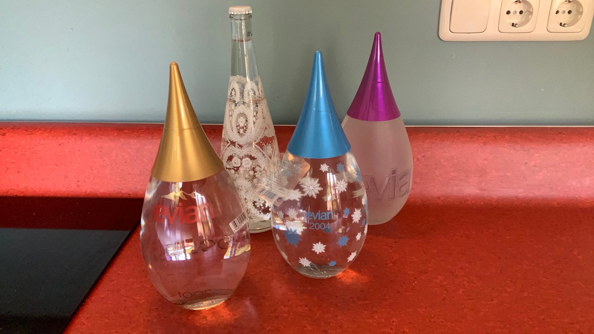 Evian Limited Edition Designflessen - Set van 4, Verzamelen, Ophalen of Verzenden, Gebruikt