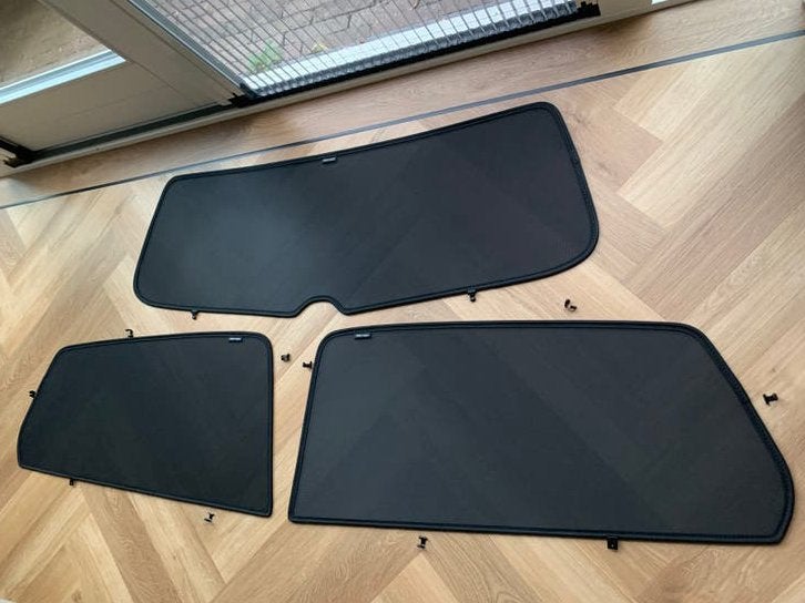 Zonwering set golf7 origineel VW zwart als nieuw, Ophalen, Nieuw, Volkswagen