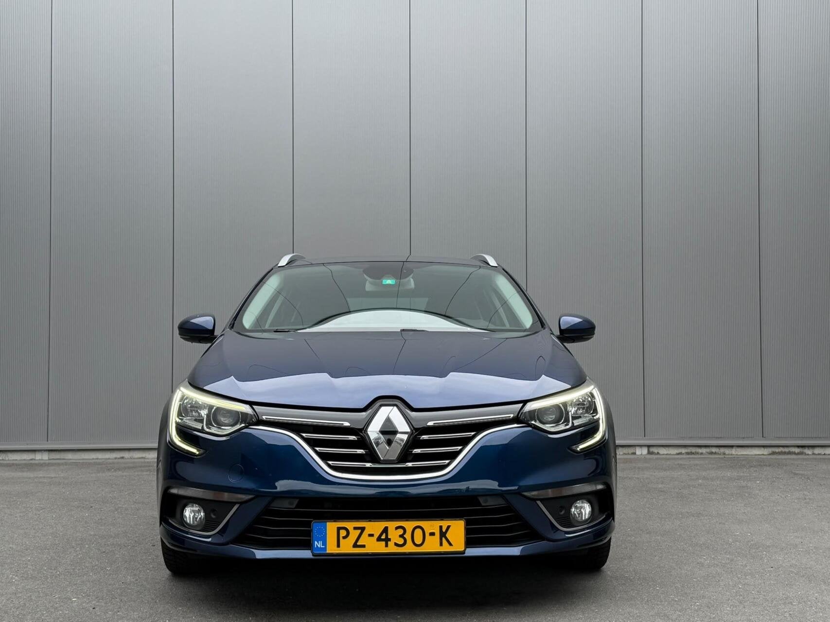 Renault Megane Estate 1.2 TCe Bose, Auto's, Voorwielaandrijving, Gebruikt, 4 cilinders, Blauw