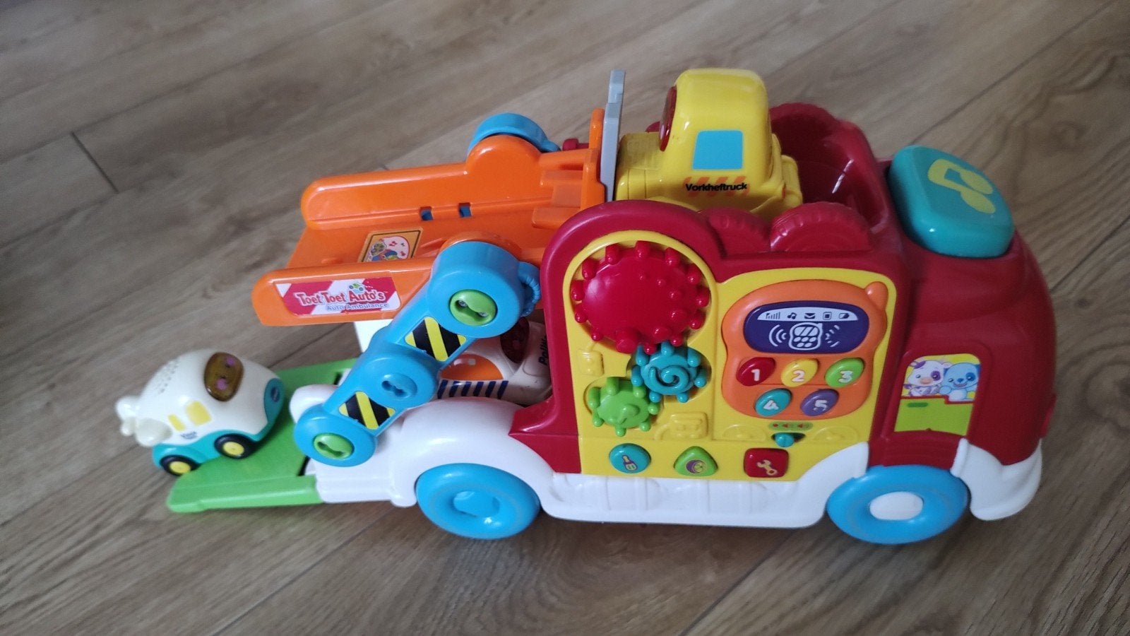 VTech oplegger met 4 auto's. met licht en geluid. Educatief, Ophalen of Verzenden, Zo goed als nieuw