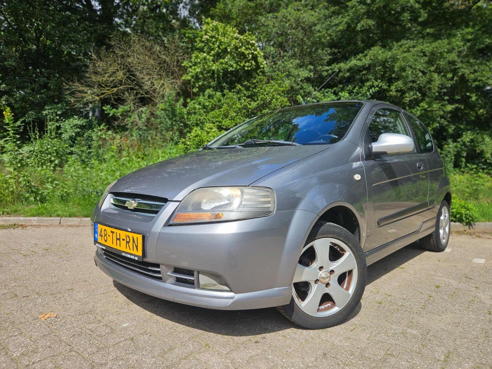 Chevrolet Kalos 1.4 16V 3D AUT 2006 Grijs, Auto's, Chevrolet, Stof, 40 €/maand, 4 cilinders, Bedrijf