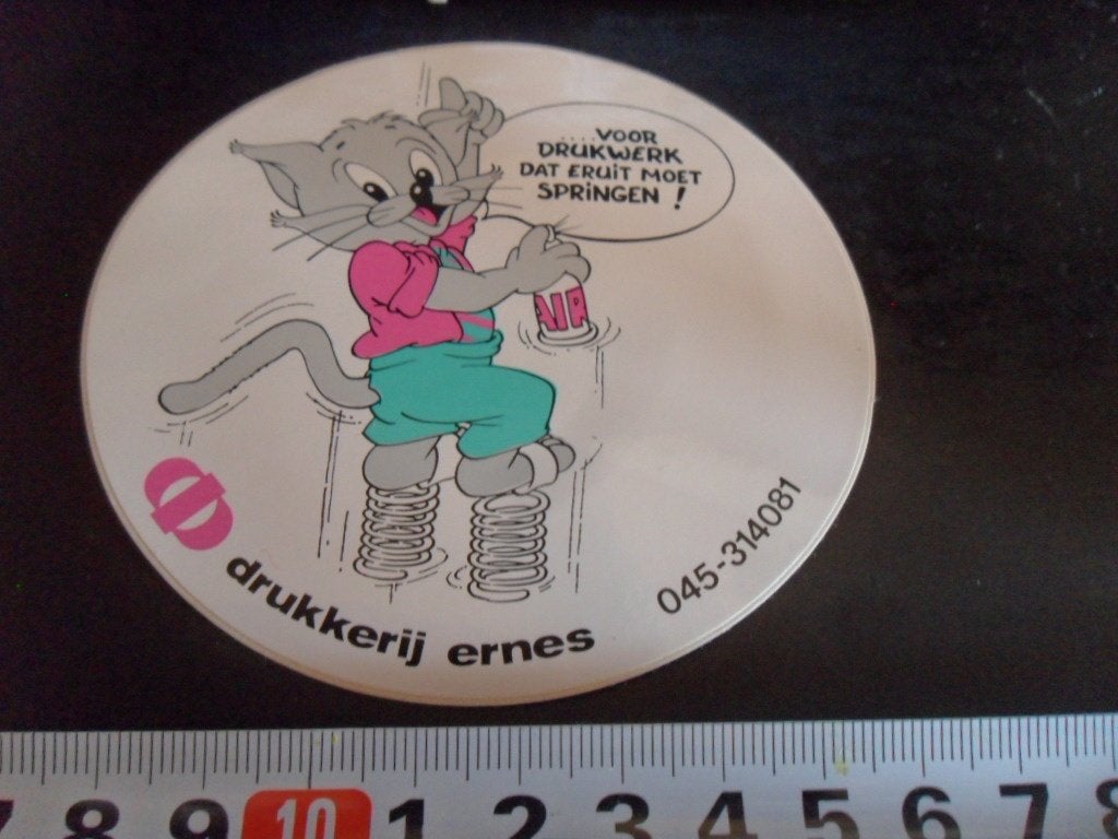 sticker strip kat spuitbus verf drukkerij ernes heerlen *, Ophalen, Zo goed als nieuw