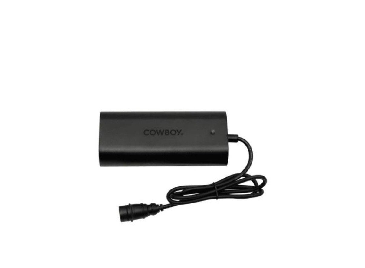 Cowboy E-bike Accu Oplader - Origineel, Fietsen en Brommers, Fietsaccessoires | Fietsaccu's, Ophalen of Verzenden, Gebruikt
