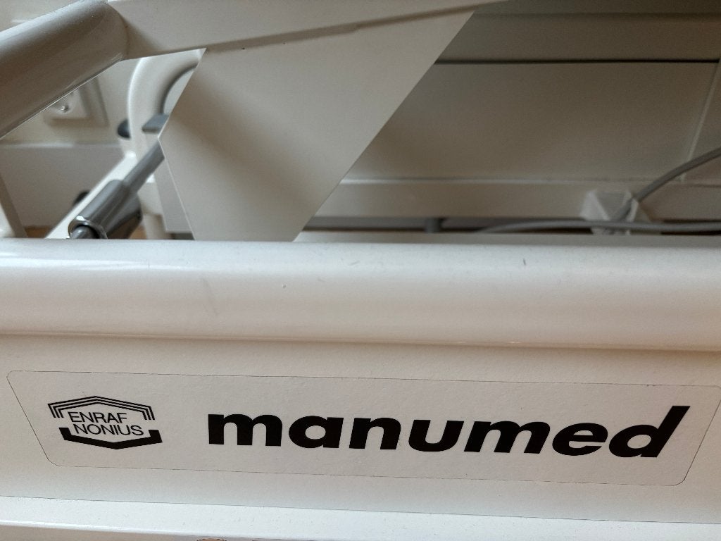 Foto 2 van Enraf Nonius Manumed 3-delige Elektrische behandeltafel