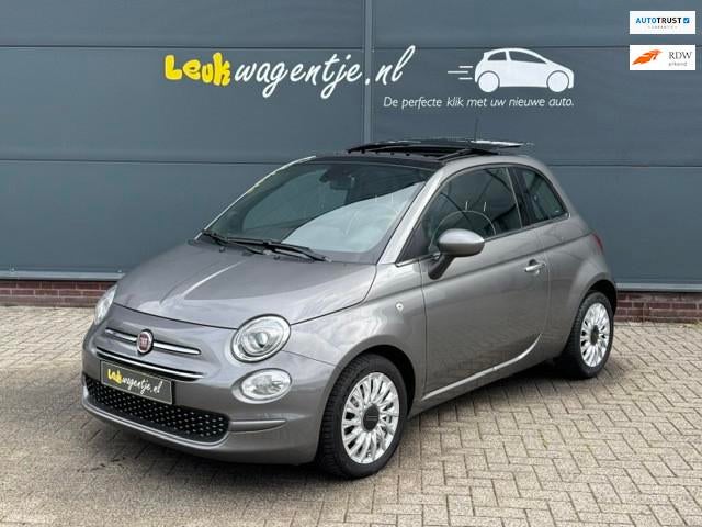 Fiat 500 1.2 Lounge Automaat *schuifdak *carplay *dealerond., Gebruikt, 4 cilinders, 4 stoelen, Leder en Stof