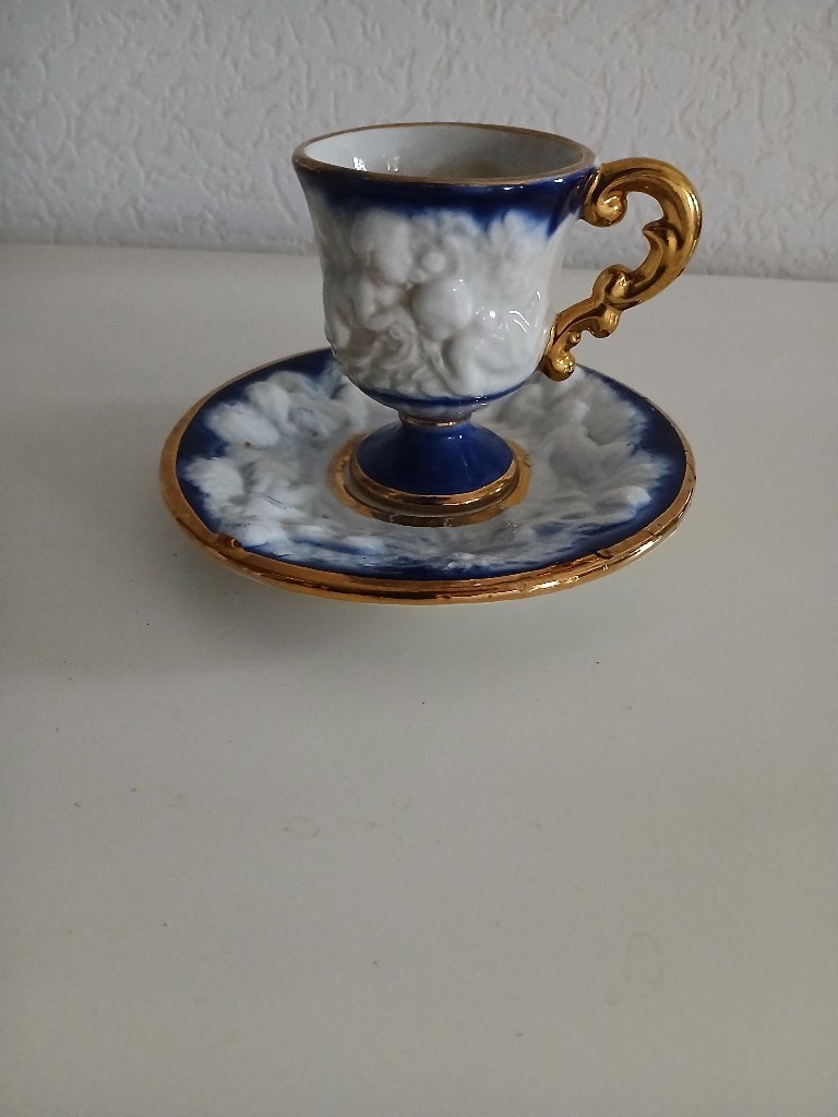 kop en schotel met putti, Ophalen of Verzenden