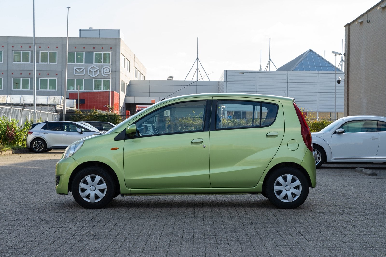 Daihatsu Cuore 1.0 5D AUT 2011 Groen, Auto's, Stof, 600 kg, Zwart, 18 €/maand