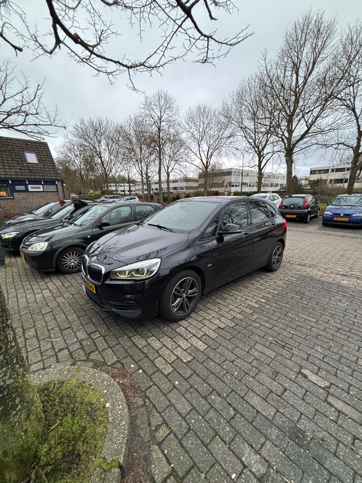 BMW 2-Serie Active Tourer 218i 140pk Aut 2018 Zwart, Auto's, Alcantara, Zwart, 75 €/maand, Particulier