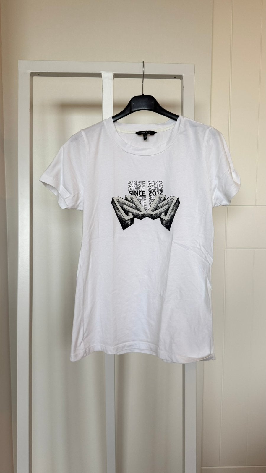 Nikkie T-shirt Maat 32 (valt als 34/36), Wit, Ophalen of Verzenden, Zo goed als nieuw, Korte mouw